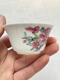 A set of six Chinese famille rose 'peonies' cups and saucers, Yongzheng/Qianlong