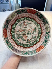 A Chinese blue and white 'floral' dish and a wucai 'floral' dish, Shunzhi/ Kangxi