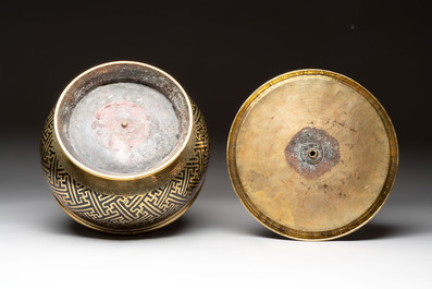 A brass betel bowl and cover with black-enamelled and engraved design, Indonesia, 19th C.