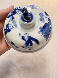 A Chinese blue and white 'figures in a landscape' bowl and cover, Kangxi mark and of the period