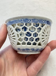 A Chinese blue and white reticulated double-walled cup, ruyi mark, Kangxi