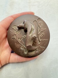 A Chinese Yixing stoneware 'squirrels among grape vines' teapot and cover, Kangxi