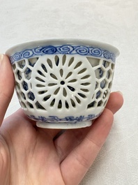 A Chinese blue and white reticulated double-walled cup, ruyi mark, Kangxi