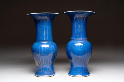 A pair of Chinese gilt-decorated powder-blue 'yenyen' vases, Kangxi