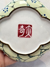 A pair of Chinese Canton enamel quadrifoil 'riverscape' saucers, Yi Qi 亦奇 mark, 18th C.