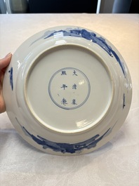 A Chinese blue and white 'elegant ladies' dish, Kangxi mark and of the period