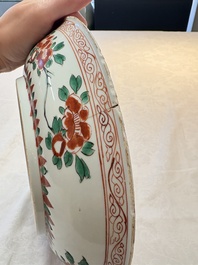 A Chinese blue and white 'floral' dish and a wucai 'floral' dish, Shunzhi/ Kangxi