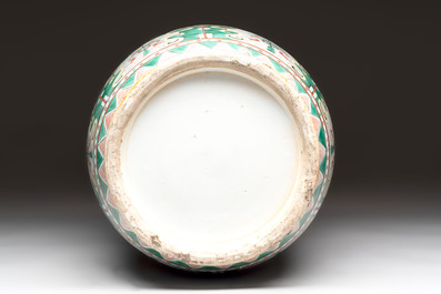 A fine Chinese famille noire 'antiquities' vase, 19th C.