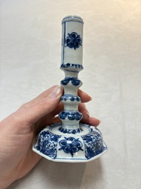 A pair of Chinese blue and white candlesticks with floral design, Kangxi