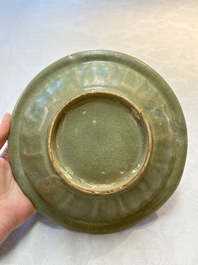 A Chinese Longquan celadon dish with floral anhua design and a 'twin fish' plate, Ming