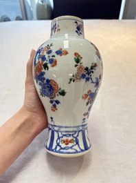 A pair of Chinese verte-Imari 'birds among flowering branches' vases and covers, Kangxi