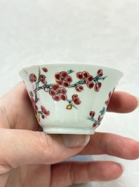 Two Chinese famille rose 'birds on flowering branches' cups and saucers, Yongzheng