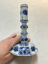 A pair of Chinese blue and white candlesticks with floral design, Kangxi