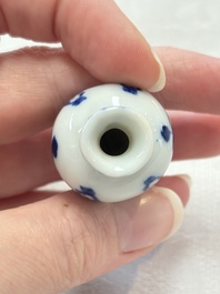 Ten Chinese blue and white miniature vases with figural and floral design, Kangxi