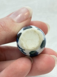 Ten Chinese blue and white miniature vases with figural and floral design, Kangxi