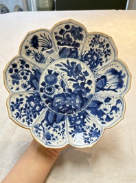 A pair of Chinese blue and white lotus-form 'Grasshopper' plates, Kangxi