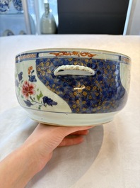 A Chinese famille rose blue-ground tureen, cover and stand, Qianlong