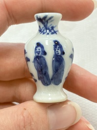 Ten Chinese blue and white miniature vases with figural and floral design, Kangxi