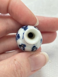 Ten Chinese blue and white miniature vases with figural and floral design, Kangxi