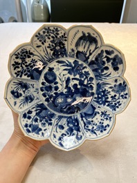 A pair of Chinese blue and white lotus-form 'Grasshopper' plates, Kangxi