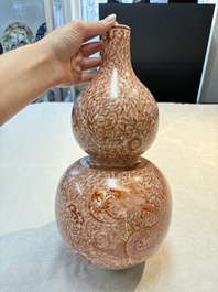 A Chinese iron-red-decorated 'dragon and phoenix' double-gourd vase, Qianlong mark, Republic
