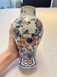 A pair of Chinese verte-Imari 'birds among flowering branches' vases and covers, Kangxi