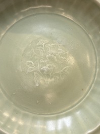 A Chinese Longquan celadon dish with floral anhua design and a 'twin fish' plate, Ming