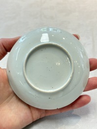 Two Chinese famille rose 'birds on flowering branches' cups and saucers, Yongzheng
