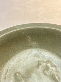 A Chinese Longquan celadon dish with floral anhua design and a 'twin fish' plate, Ming