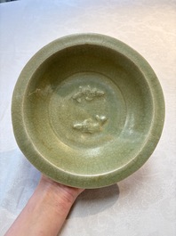A Chinese Longquan celadon dish with floral anhua design and a 'twin fish' plate, Ming