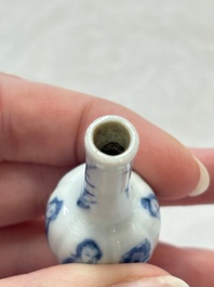 Ten Chinese blue and white miniature vases with figural and floral design, Kangxi