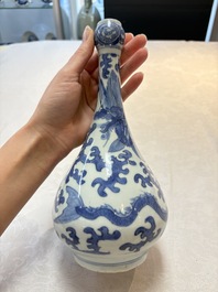 A Chinese blue and white 'winged dragon' garlic-mouth vase, Wanli