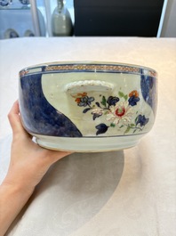 A Chinese famille rose blue-ground tureen, cover and stand, Qianlong