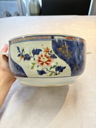 A Chinese famille rose blue-ground tureen, cover and stand, Qianlong