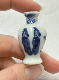 Ten Chinese blue and white miniature vases with figural and floral design, Kangxi