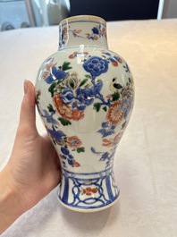 A pair of Chinese verte-Imari 'birds among flowering branches' vases and covers, Kangxi