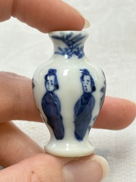 Ten Chinese blue and white miniature vases with figural and floral design, Kangxi