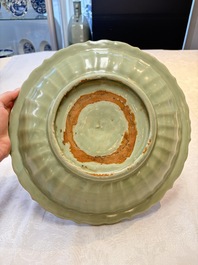 A Chinese Longquan celadon dish with floral anhua design and a 'twin fish' plate, Ming
