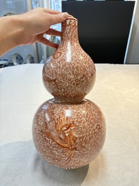 A Chinese iron-red-decorated 'dragon and phoenix' double-gourd vase, Qianlong mark, Republic