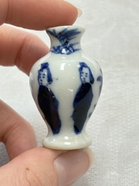 Ten Chinese blue and white miniature vases with figural and floral design, Kangxi
