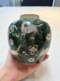 A Chinese famille noire 'prunus blossom' jar and a famille verte 'flying horses' jar, 19th C.