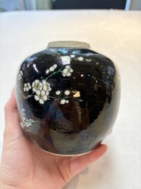 A Chinese famille noire 'prunus blossom' jar and a famille verte 'flying horses' jar, 19th C.