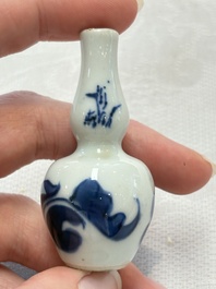 Ten Chinese blue and white miniature vases with figural and floral design, Kangxi