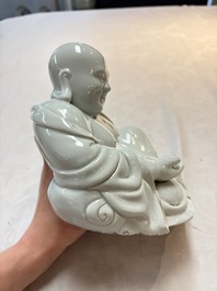 A Chinese famille rose Milefo Buddha and a white-glazed Milefo Buddha, 19th C.