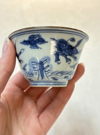 A pair of Chinese blue and white 'flying horses' cups, Jiajing mark, Kangxi
