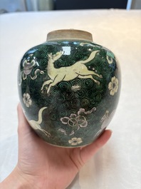 A Chinese famille noire 'prunus blossom' jar and a famille verte 'flying horses' jar, 19th C.
