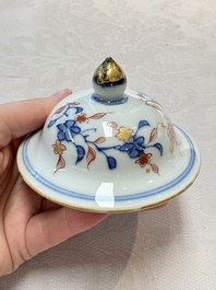 A pair of Chinese verte-Imari 'birds among flowering branches' vases and covers, Kangxi