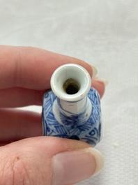 Ten Chinese blue and white miniature vases with figural and floral design, Kangxi