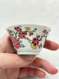 Two Chinese famille rose 'birds on flowering branches' cups and saucers, Yongzheng