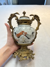 A Chinese famille verte covered bowl, a Dutch-decorated bowl, a gilt-bronze mounted pot-pourri vase and an Imari-style covered jug, Kangxi/Qianlong